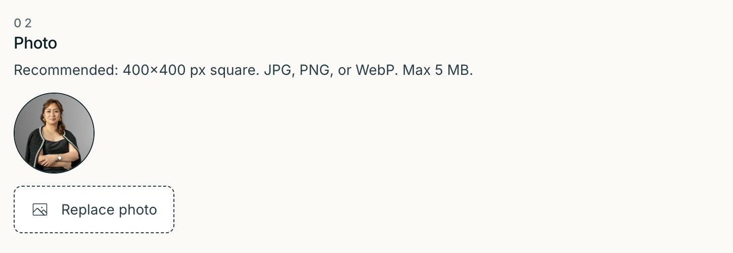 The Photo section — current headshot circle on the left, file picker button on the right. Phone-camera photos get auto-resized so a 5 MB raw shot still uploads cleanly.